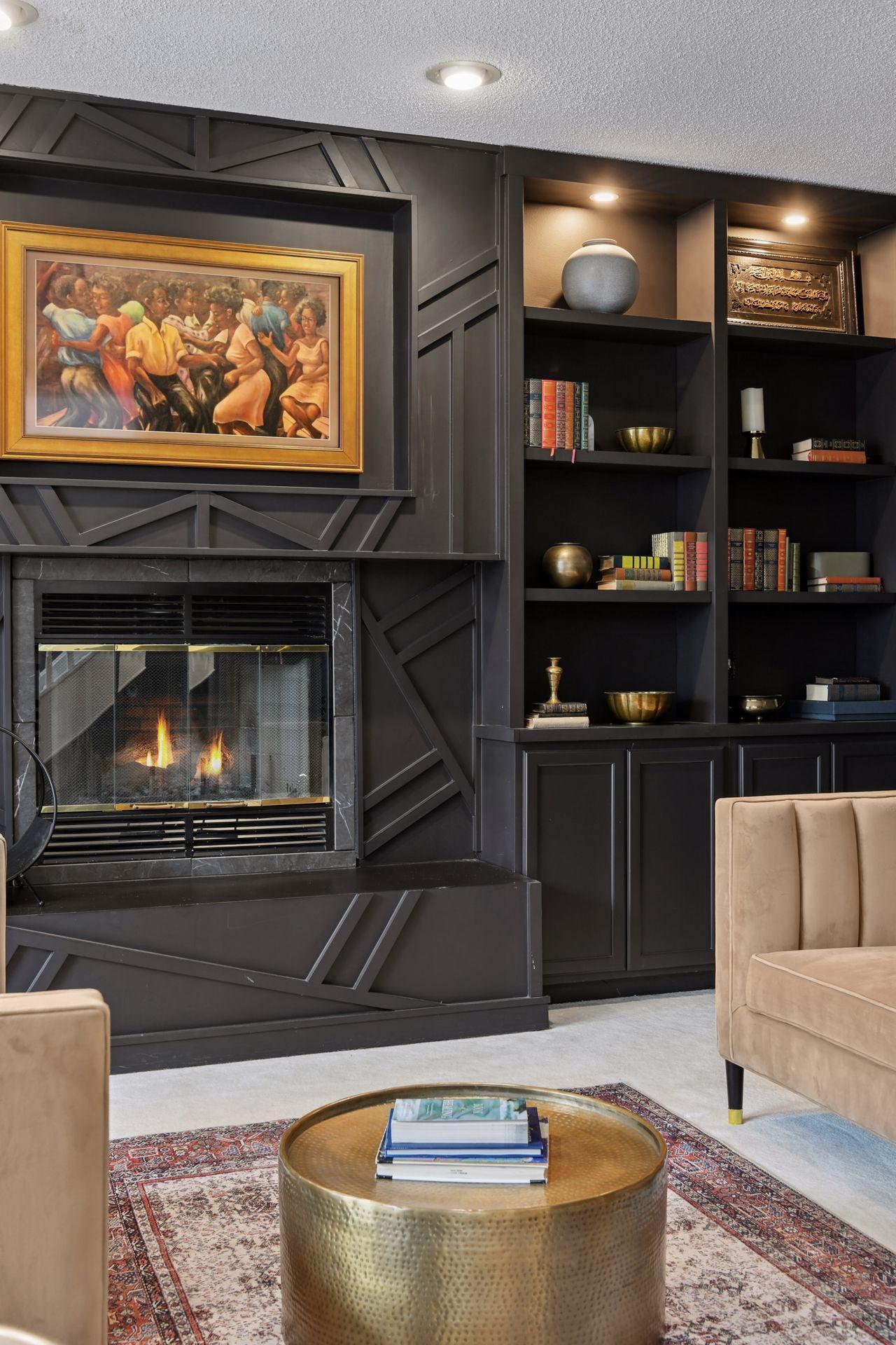 Beautifully crafted built-ins frame the library with warmth and intention — offering both architectural interest and functional sophistication.