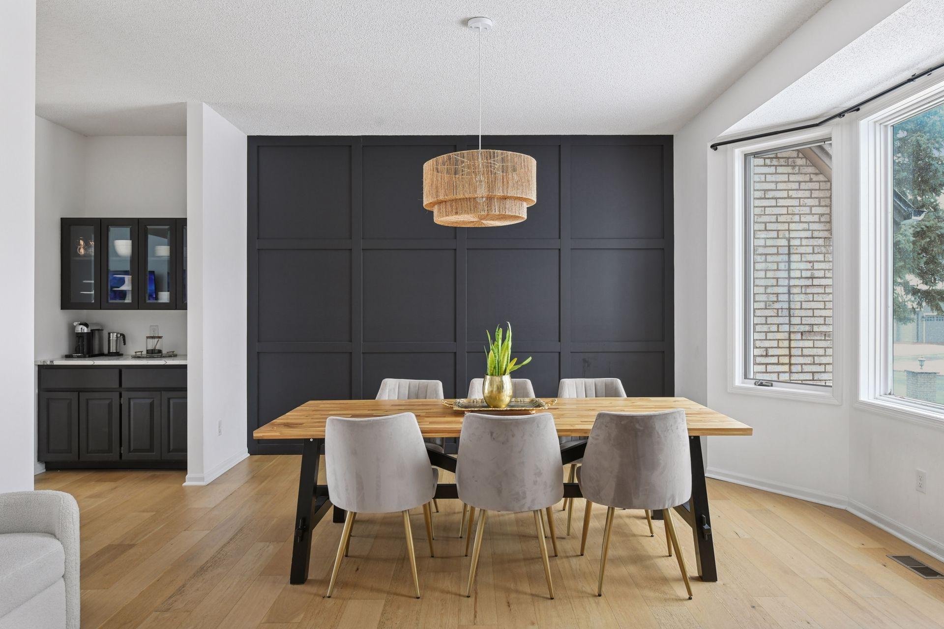 A light filled dining space with proportions ideal for intimate dinners or full-scale celebrations. A beautifully designed walk-through featuring glass-front cabinetry for china display and dedicated storage for coffee service or cocktails.
