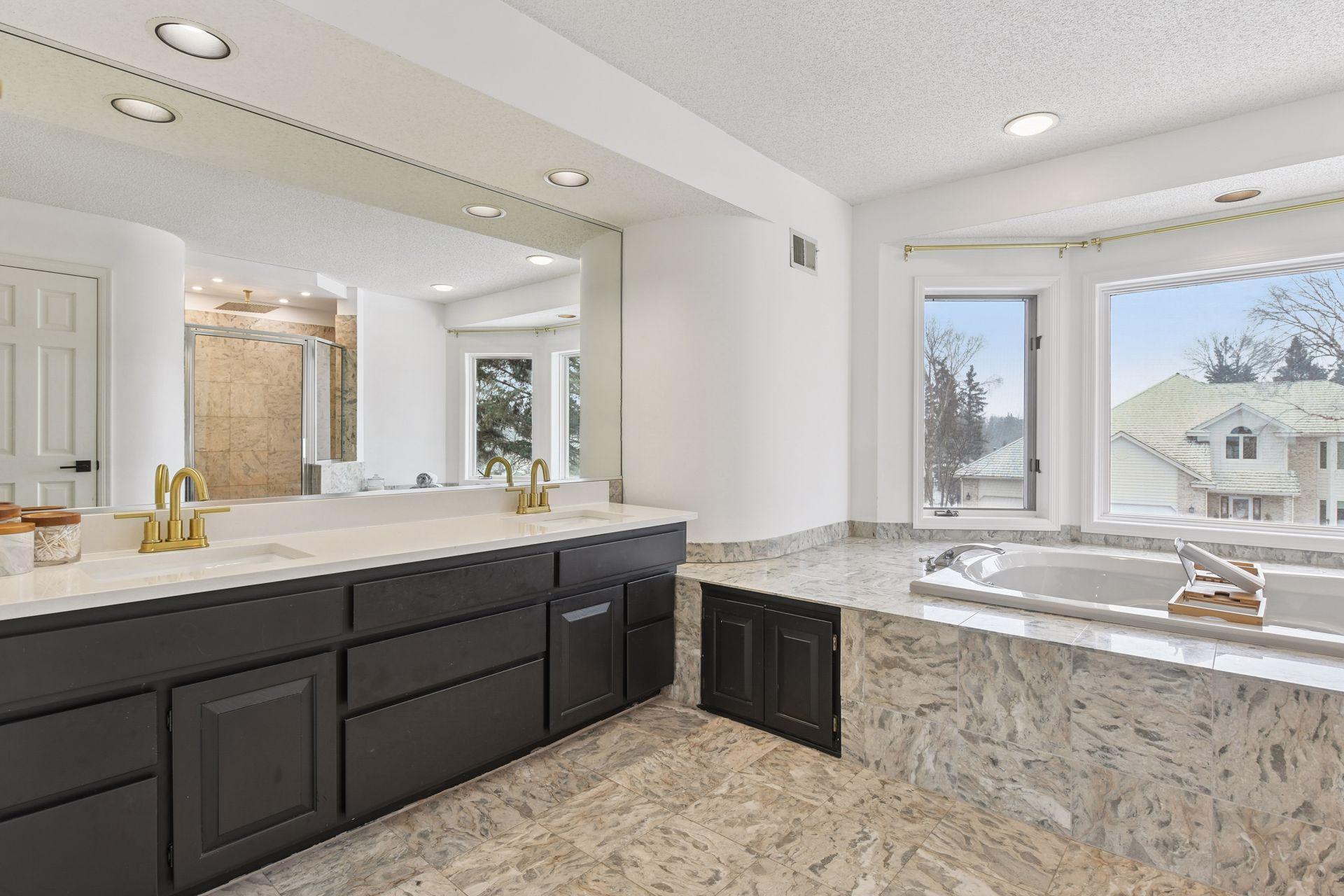 Beautiful tile flooring enhances the suite’s spa-like ambiance with timeless texture and polish.