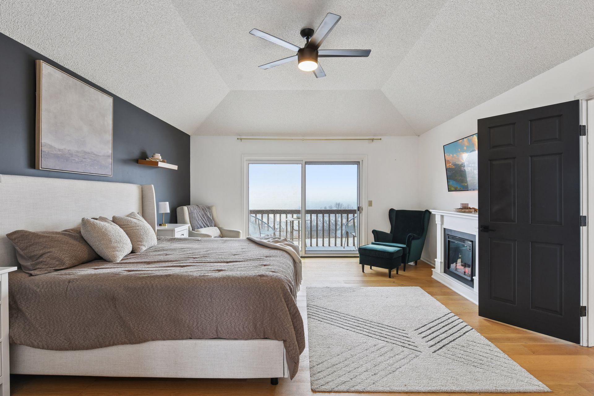 A secluded balcony extends the suite outdoors — the perfect setting for coffee at sunrise or quiet reflection at dusk.