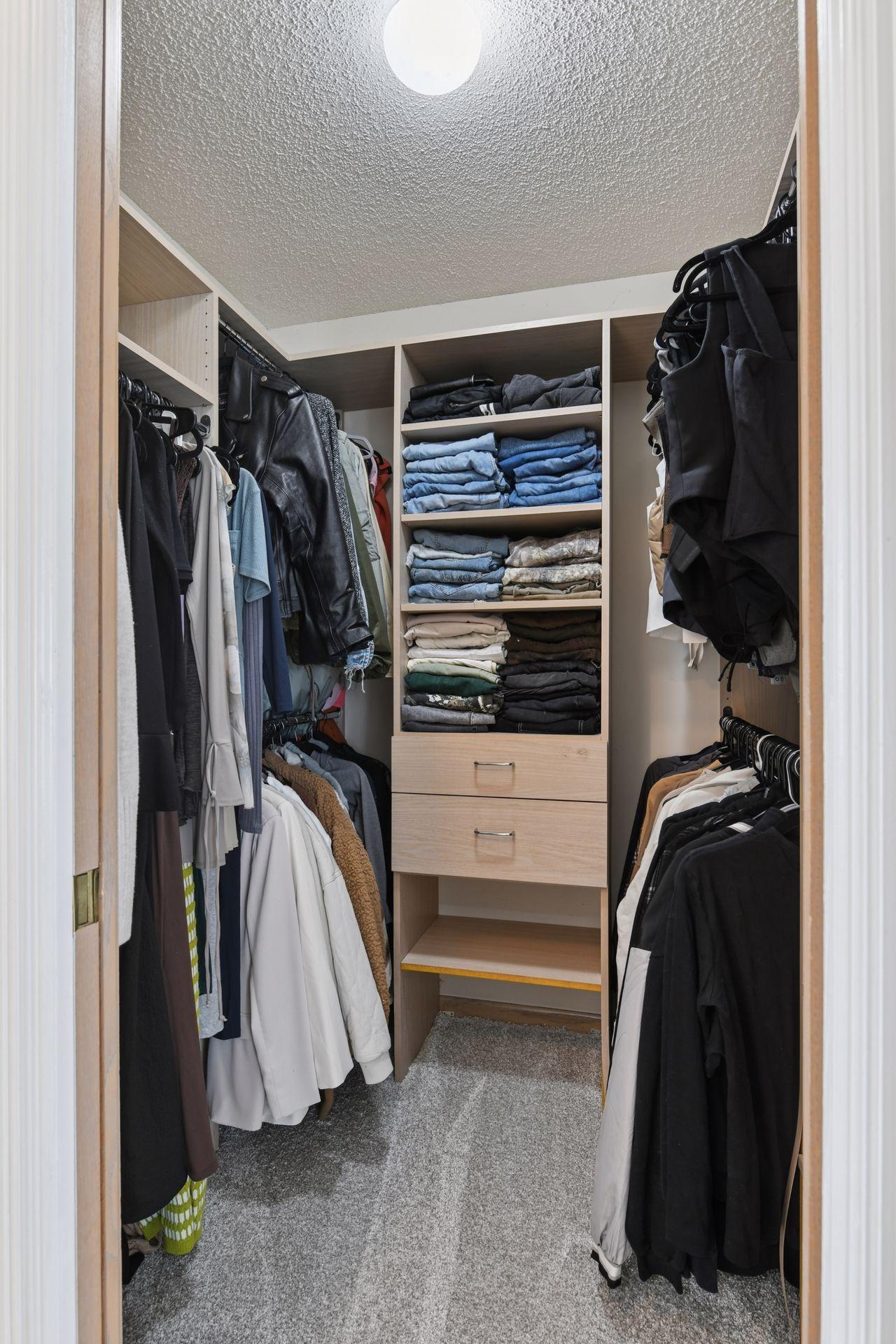 Custom closets with new flooring and phenomenal storage space.