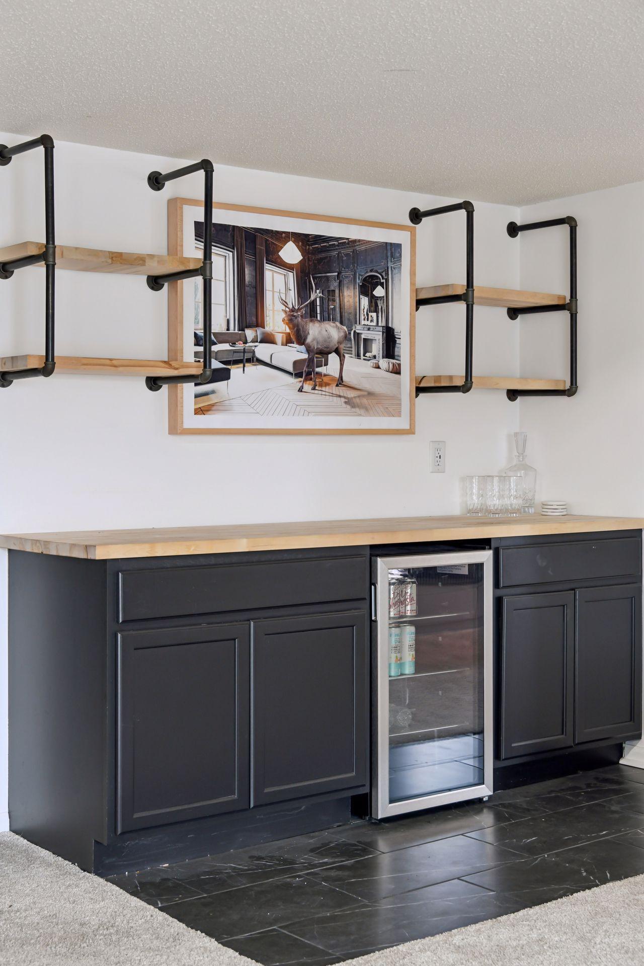 A dedicated bar complete with beverage fridge makes hosting seamless — perfectly positioned for game nights or poolside gatherings.