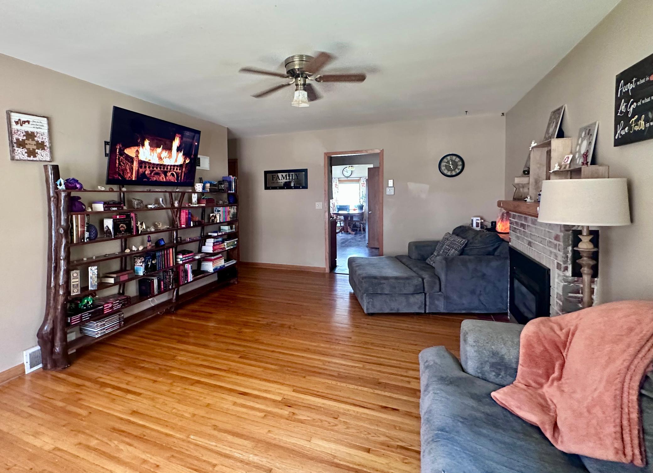 Original hardwood floors flow through majority of the main floor.