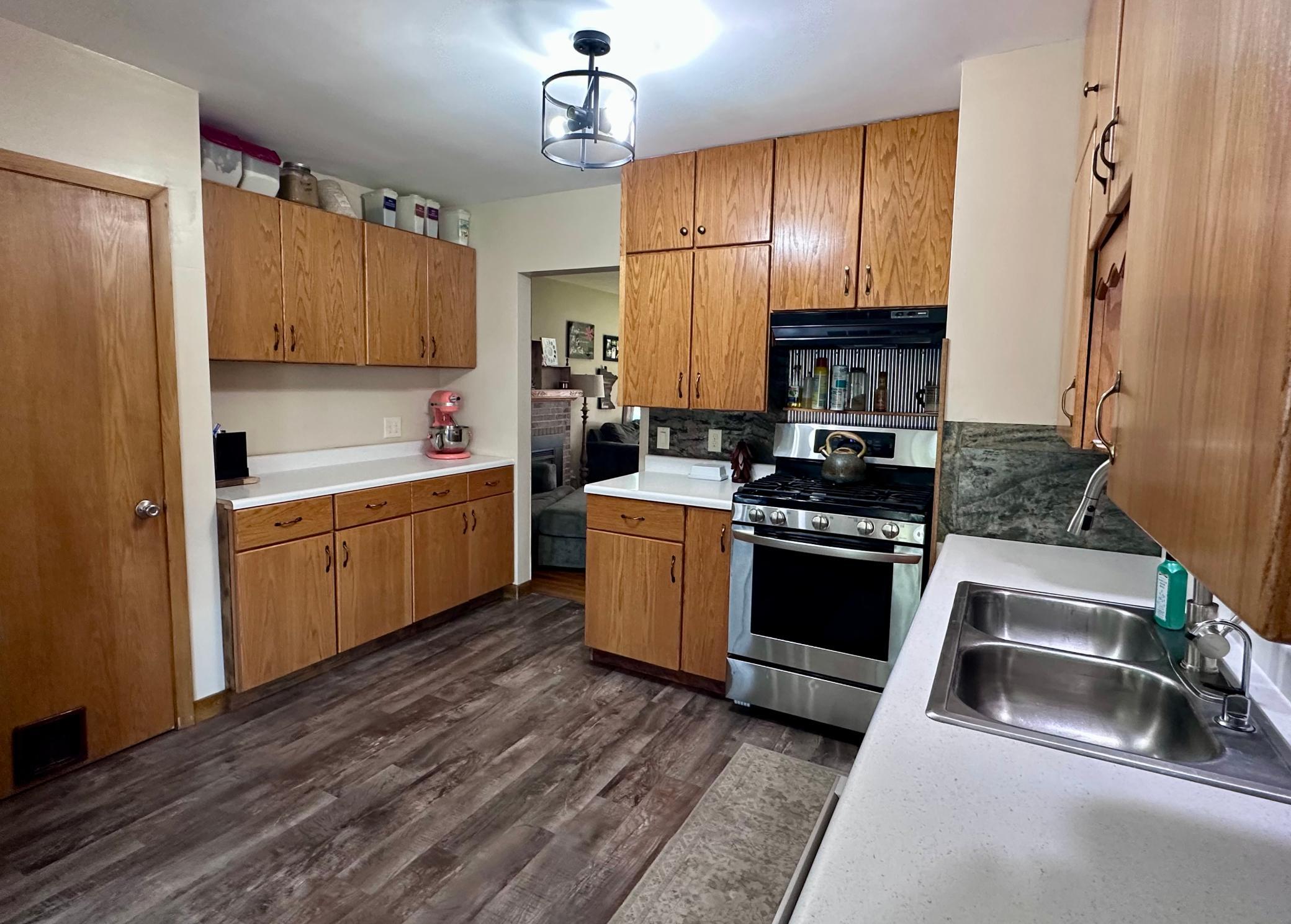 Restructuring of the kitchen offered additional counterspace and storage.