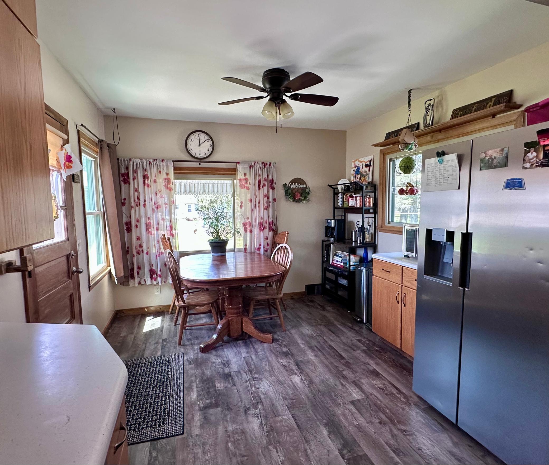 Dining Room is open to the kitchen, which offers great communication when entertaining, plus the door exits out to the backyard patio area.