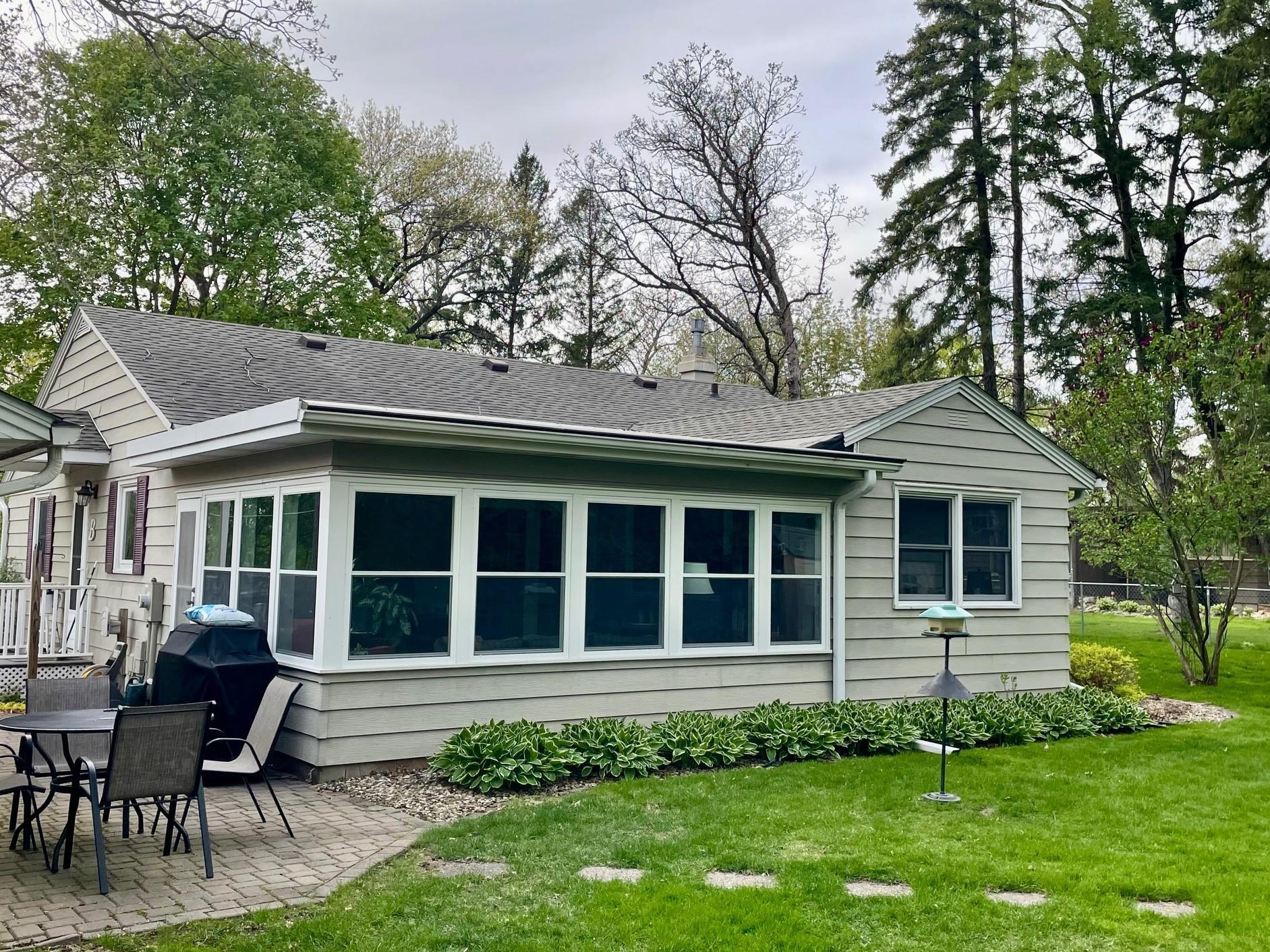 Sunny 3-season porch and backyard patio area