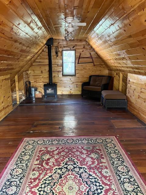 Inside room over garage with fire place