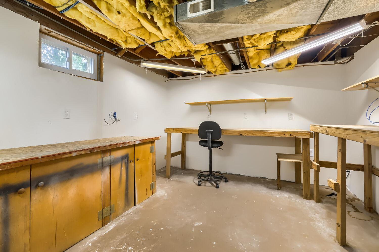Basement Workshop. insulation in the ceiling was put there for sound proofing.