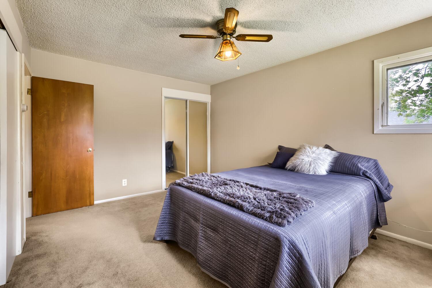 primary bedroom with private 3/4 bathroom