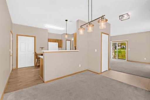 Both the dining room and patio for grilling are just steps from the kitchen