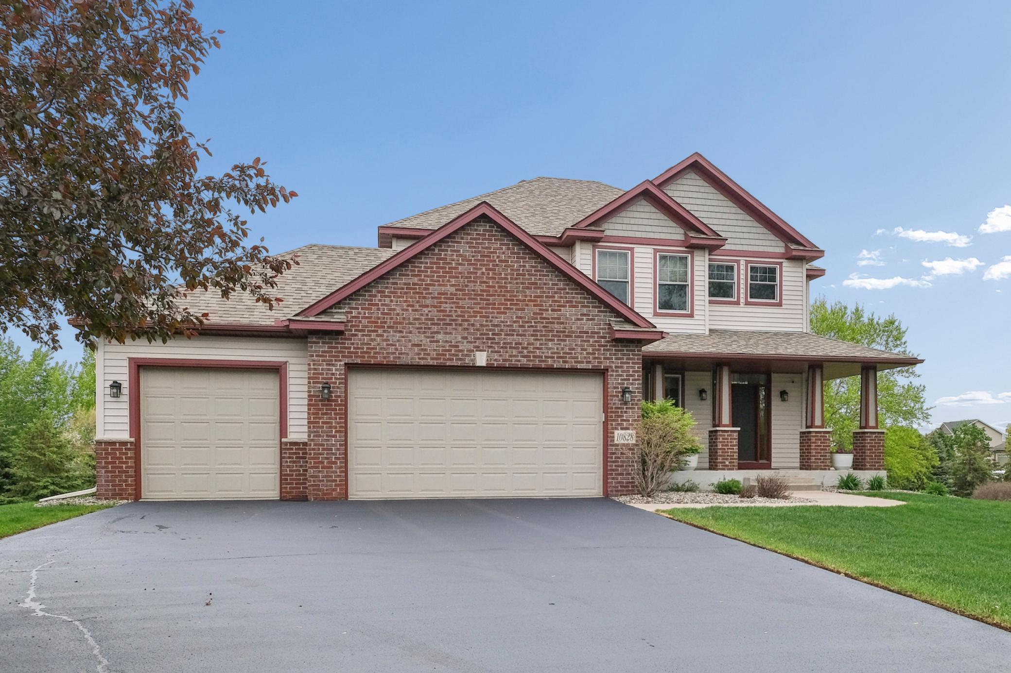 3 car garage and upgraded landscaping