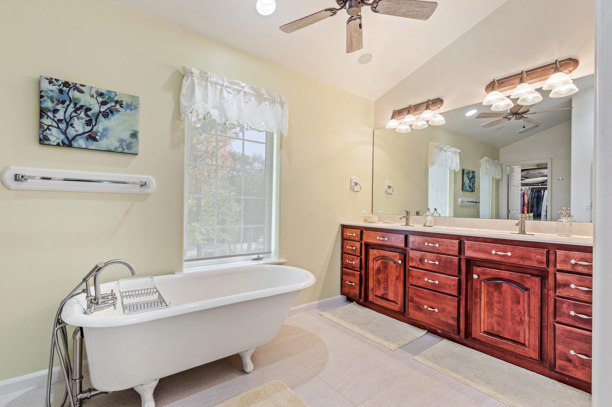 Master Bathroom with Tub and Double Vanity
