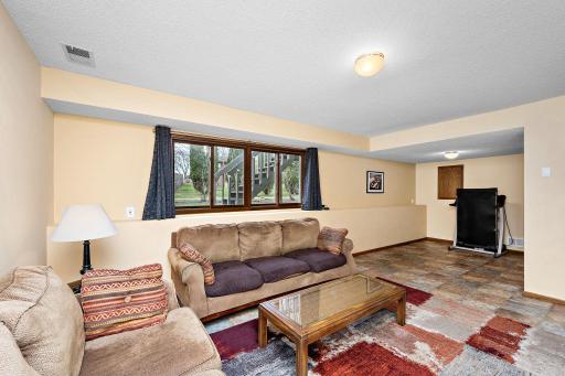 The spacious family room has an extra area for an office or gaming (or 4th bedroom possibilities)!