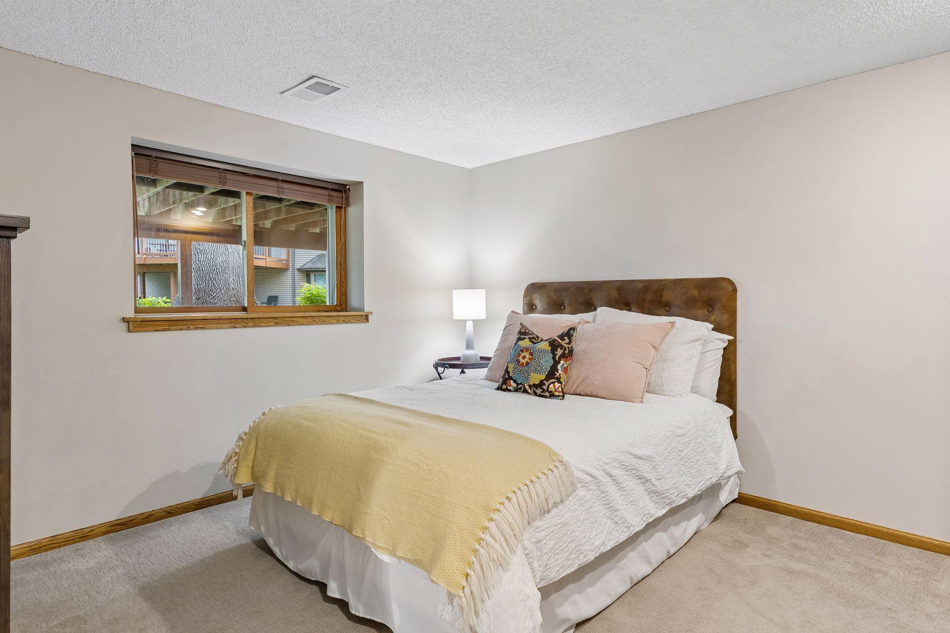 Fourth bedroom on the lower level is spacious and great for family, guests, or intergenerational living with an updated 3/4 bath also on this level.