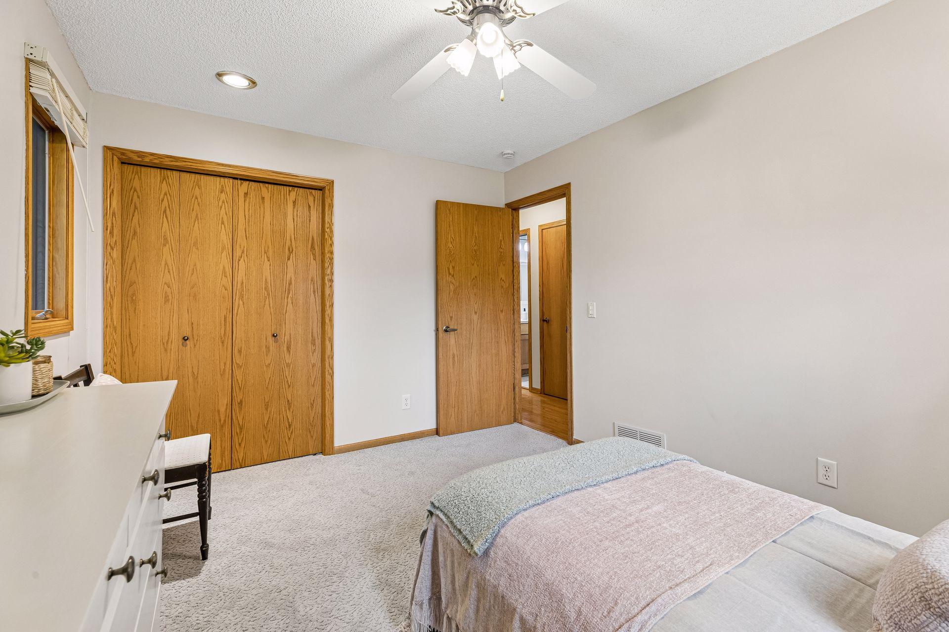 2 windows in the second bedroom fill the room with natural light.