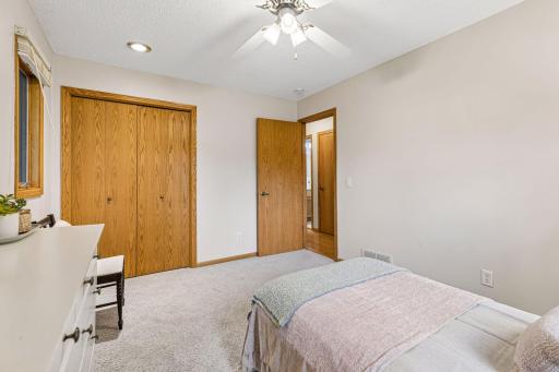 2 windows in the second bedroom fill the room with natural light.
