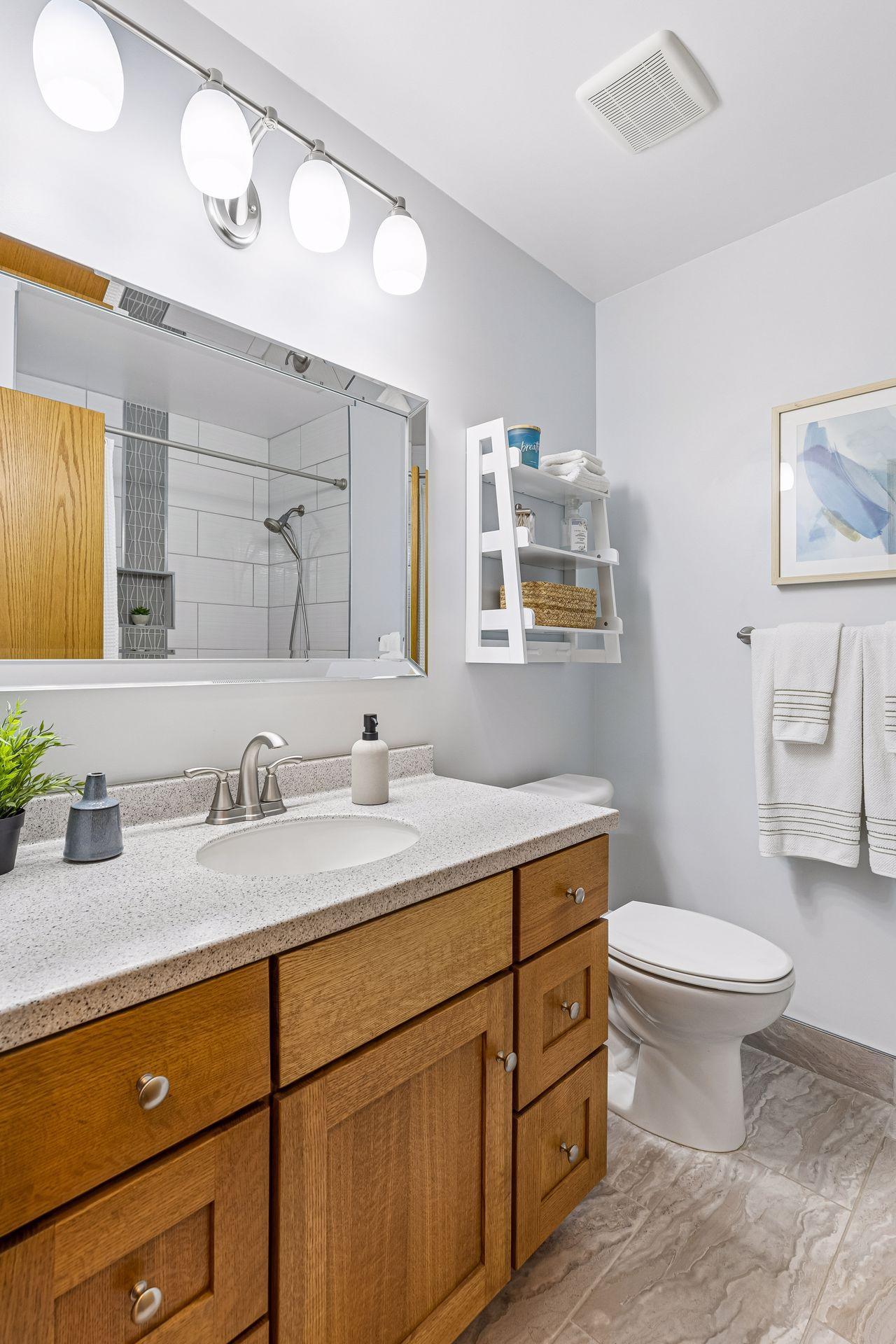 Main level full bath has also been recently updated with high end finishes.
