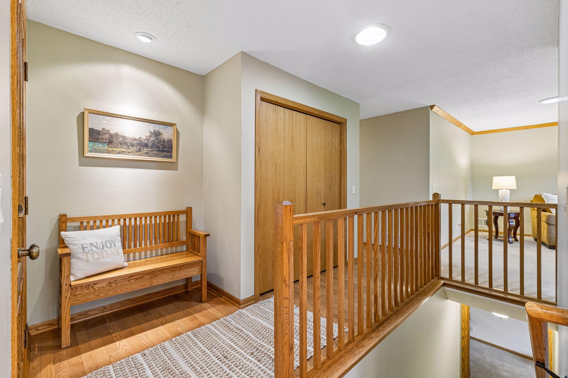 A lighted bench nook makes for an inviting and functional entrance.