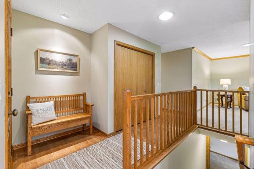 A lighted bench nook makes for an inviting and functional entrance.