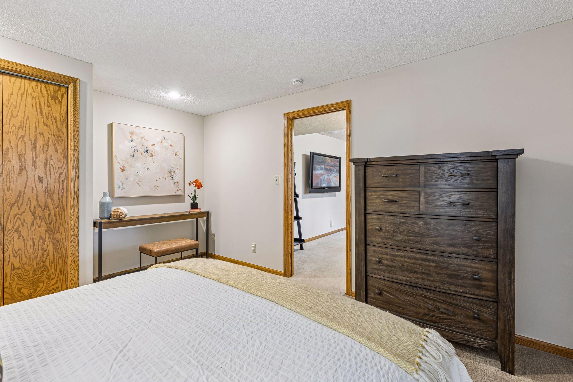 A pocket door provide privacy for the 4th bedroom.