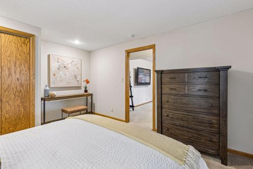 A pocket door provide privacy for the 4th bedroom.