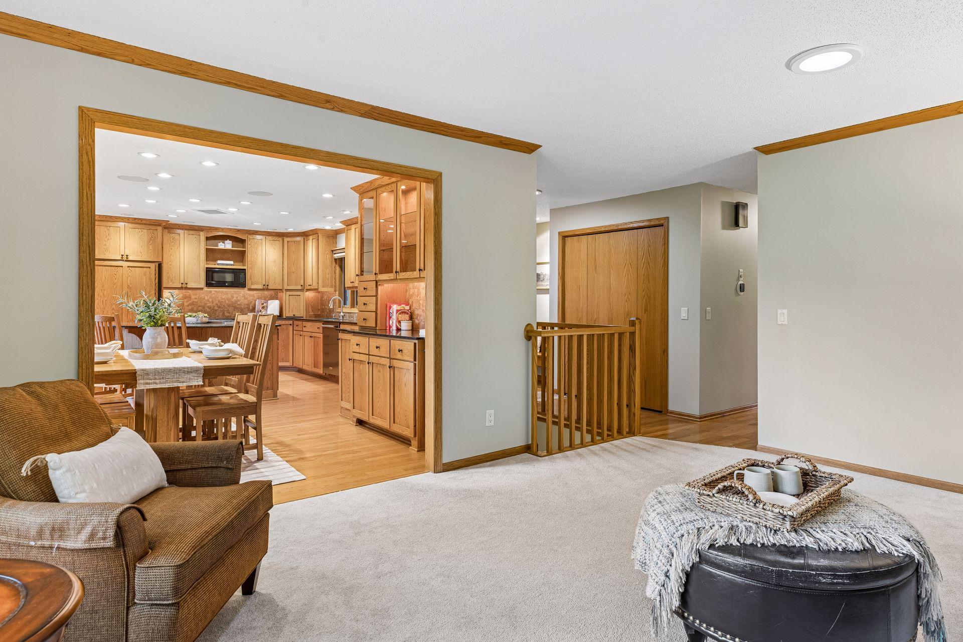 Living room flows into the informal dining, making this a great space for family life and entertaining.