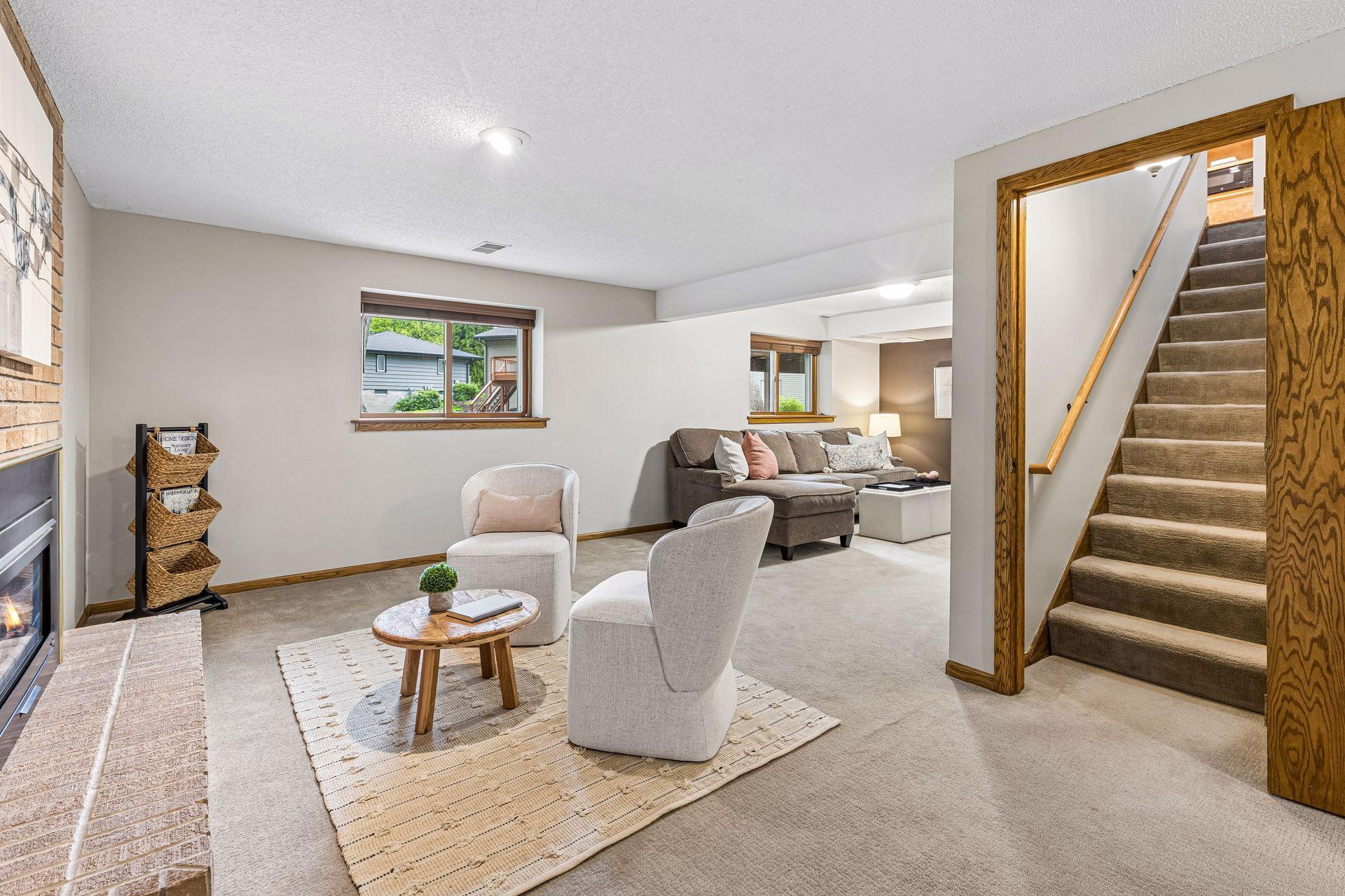 Lower level family room has a pond view as well.