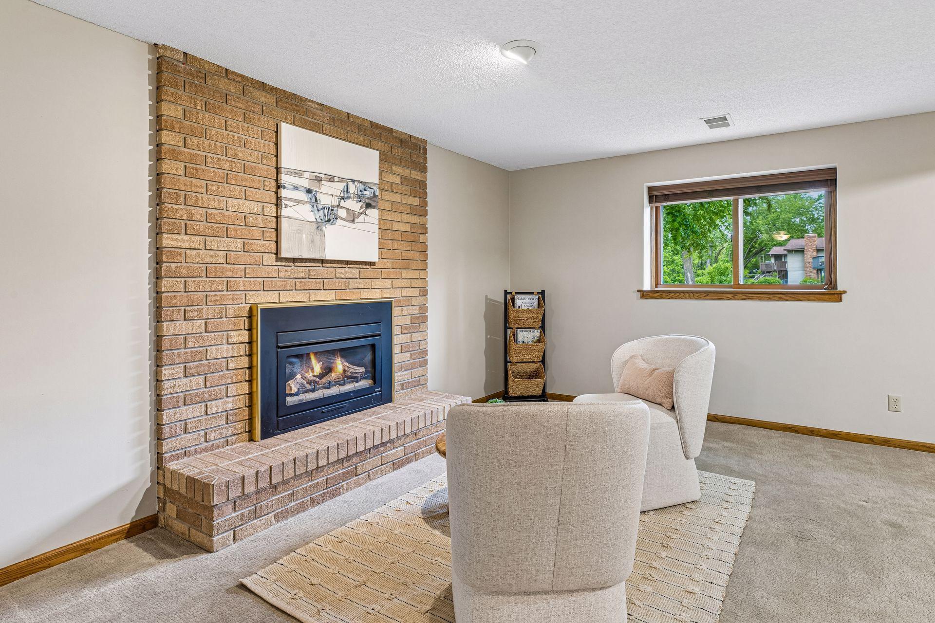 Gas fireplace adds a coziness on chilly nights in MN, and provides a spot for a nice chat or good read.