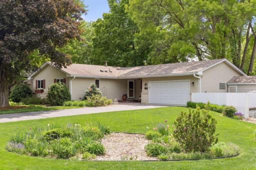 Beautifully landscaped yard and newly resurfaced driveway.