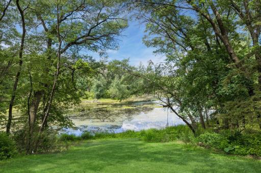 Nature as Your Neighbor, expansive lawns, mature trees, and beautiful pond views create an exceptionally private setting that can be enjoyed throughout the year.
