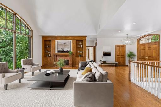 A Grand Welcome, step inside to beautifully crafted woodwork and soaring vaulted ceilings, where thoughtfully designed living spaces unfold before you. Virtual staging