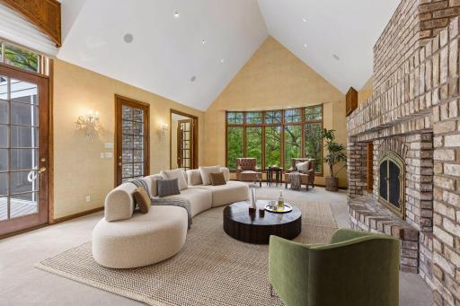 Warm & Inviting Gathering Space, the spacious Family Room is anchored by a striking two-sided gas fireplace and opens seamlessly to the Screen Porchâperfect for relaxing or entertaining in every season. Virtual staging