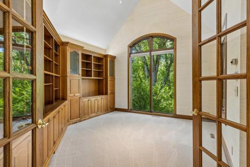 A Private Retreat, custom built-ins and exceptional woodwork create an inviting space for working from home, reading, or simply enjoying a quiet moment.