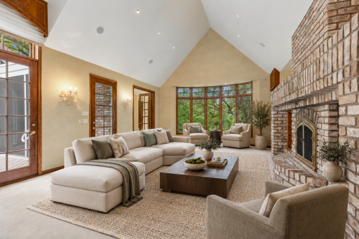 Warm & Inviting Gathering Space, the spacious Family Room is anchored by a striking two-sided gas fireplace and opens seamlessly to the Screen Porchâperfect for relaxing or entertaining in every season. Virtual staging