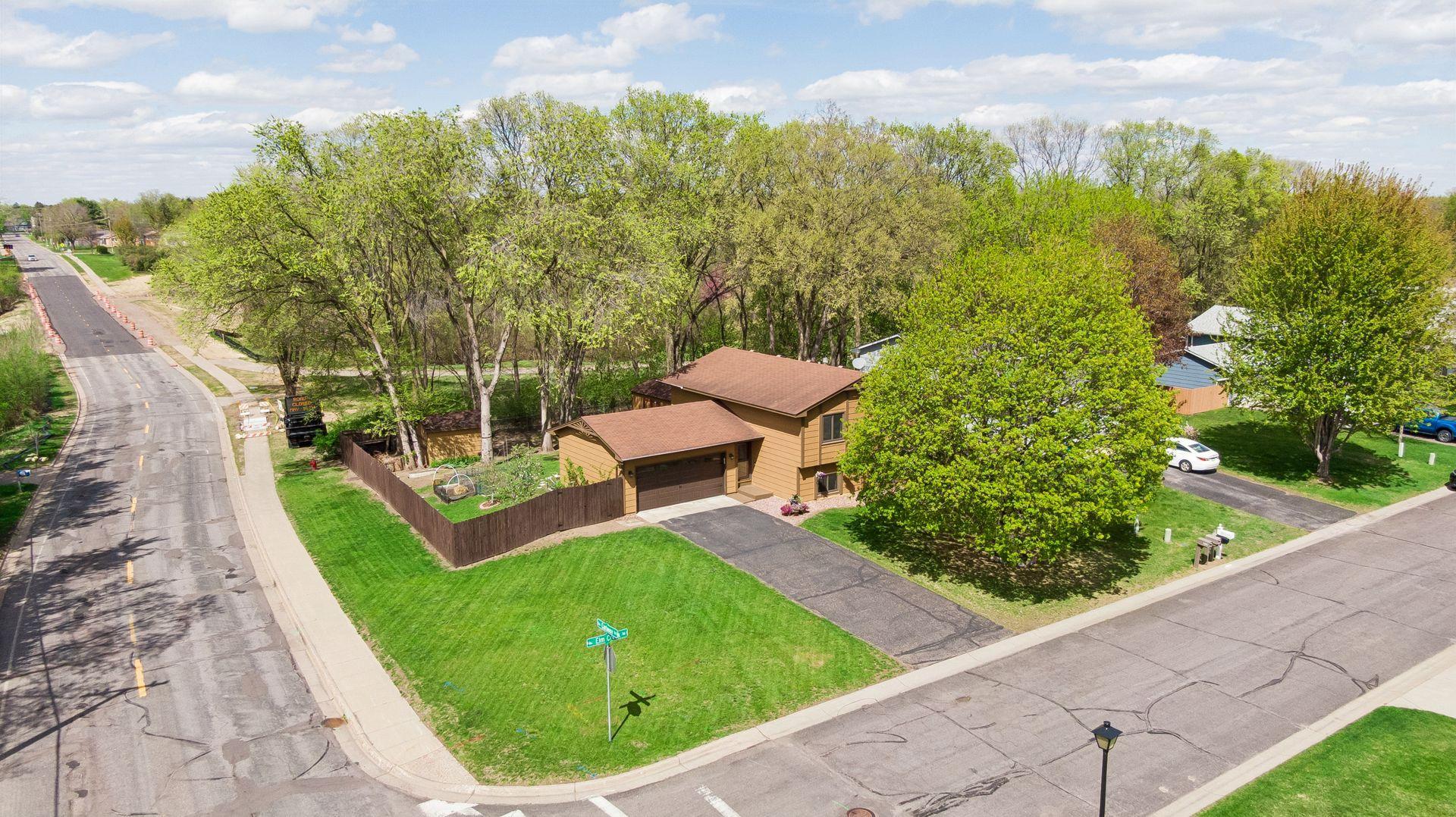 Short walk from the sidewalk to Elm Creek ,where you can launch your kayak or access the trails