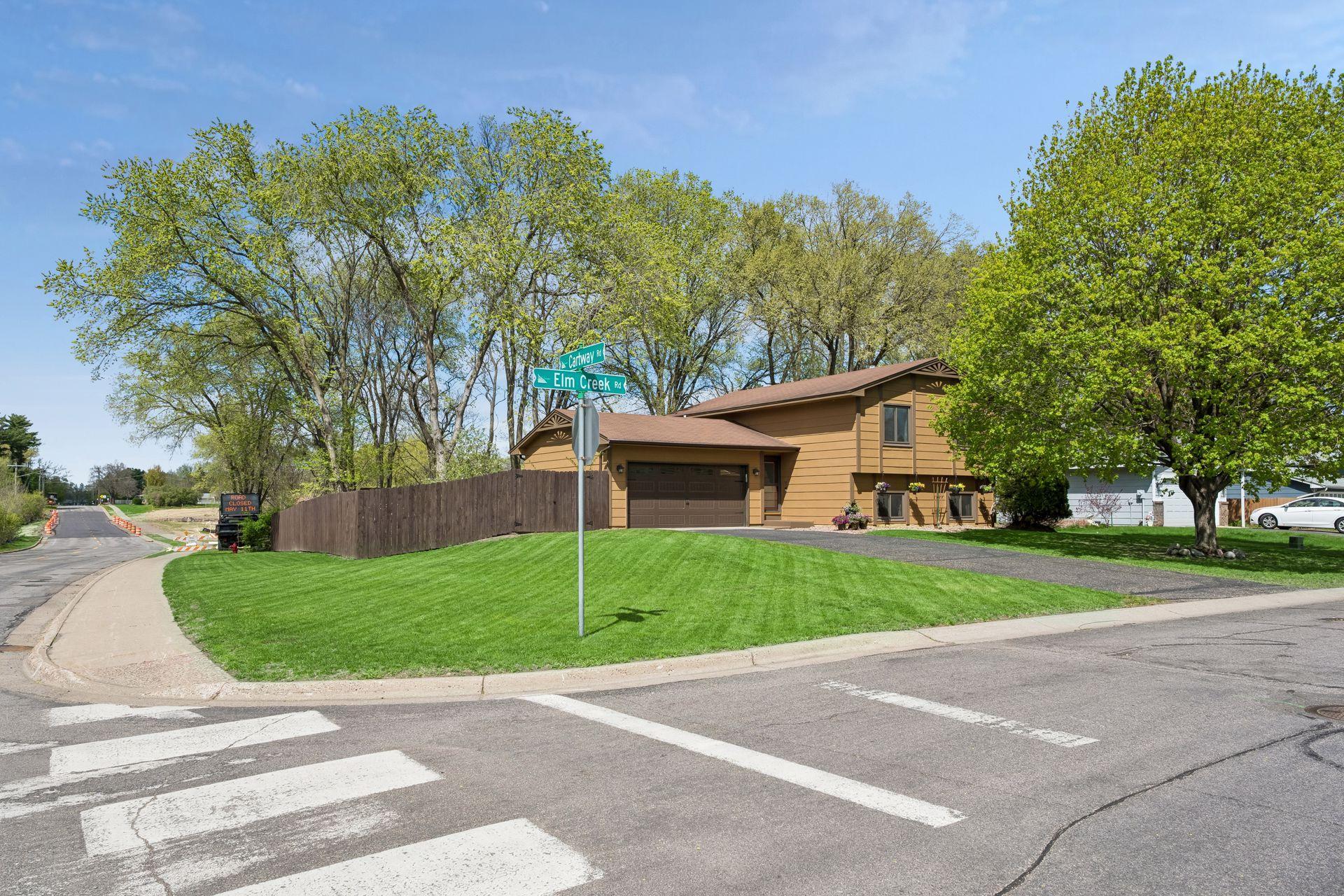 Wonderful corner lot with easy access to the sidewalk and the trails