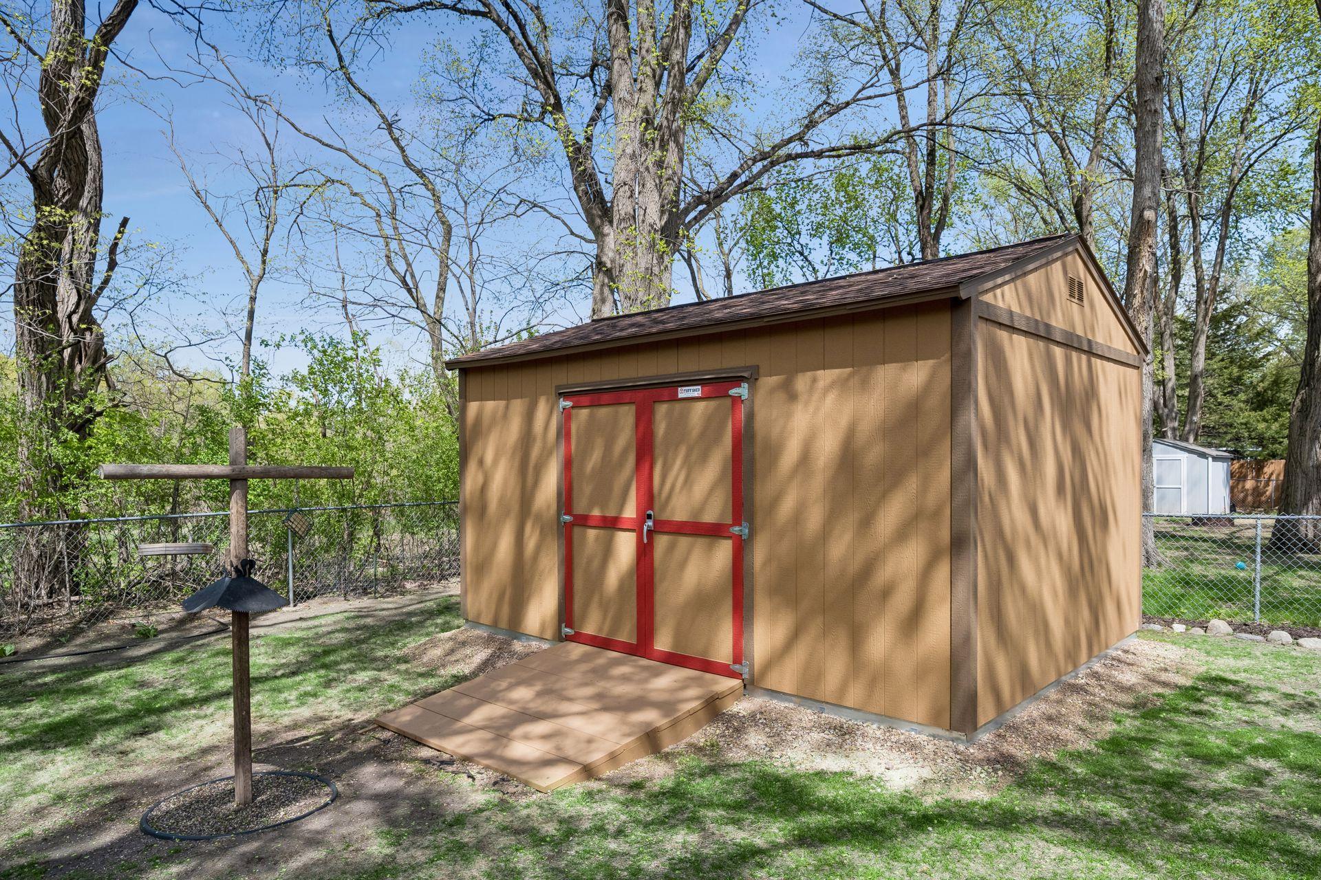 Large 12 x 16 shed in backyard - new in Autumn 2025