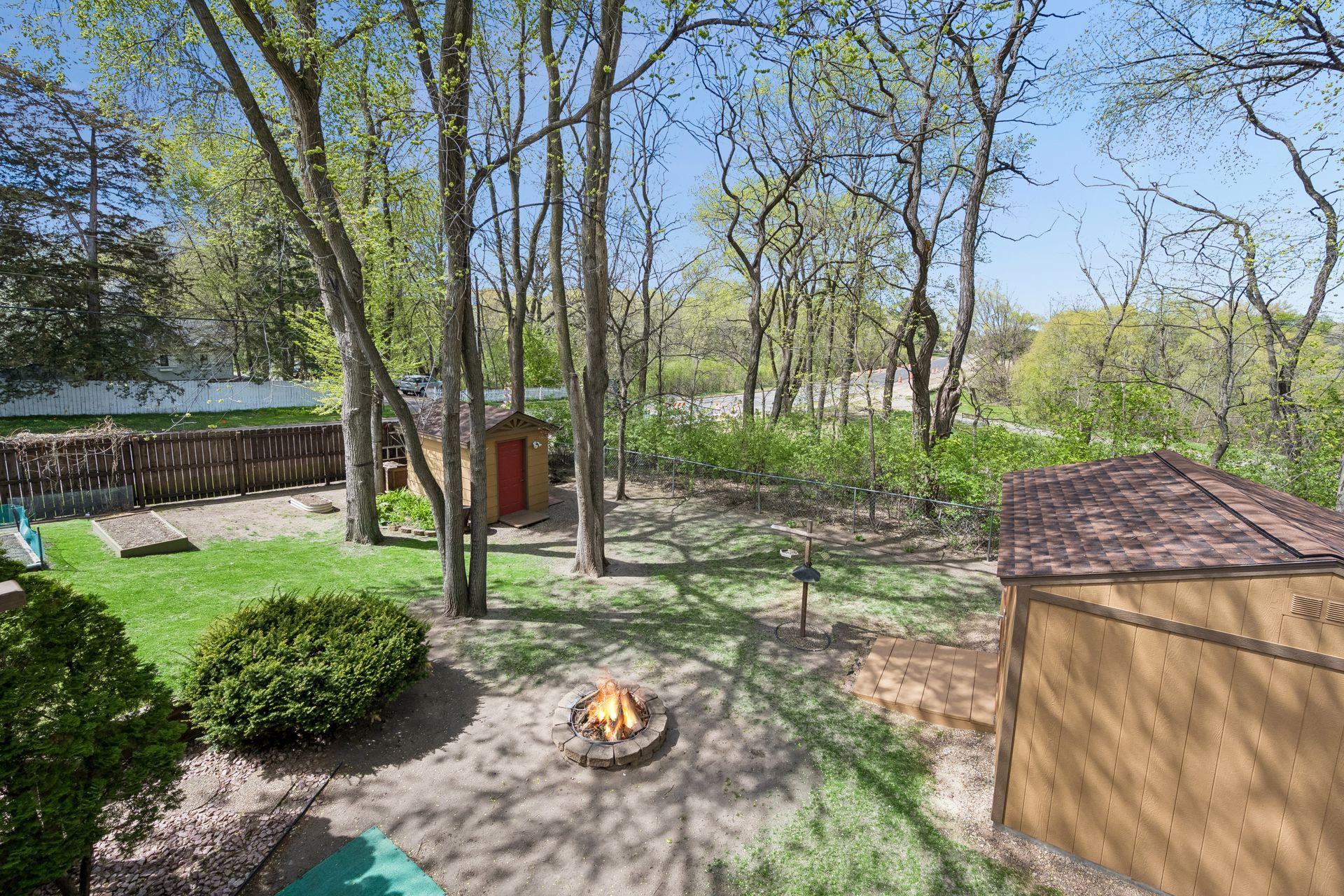 Spacious backyard with fire pit