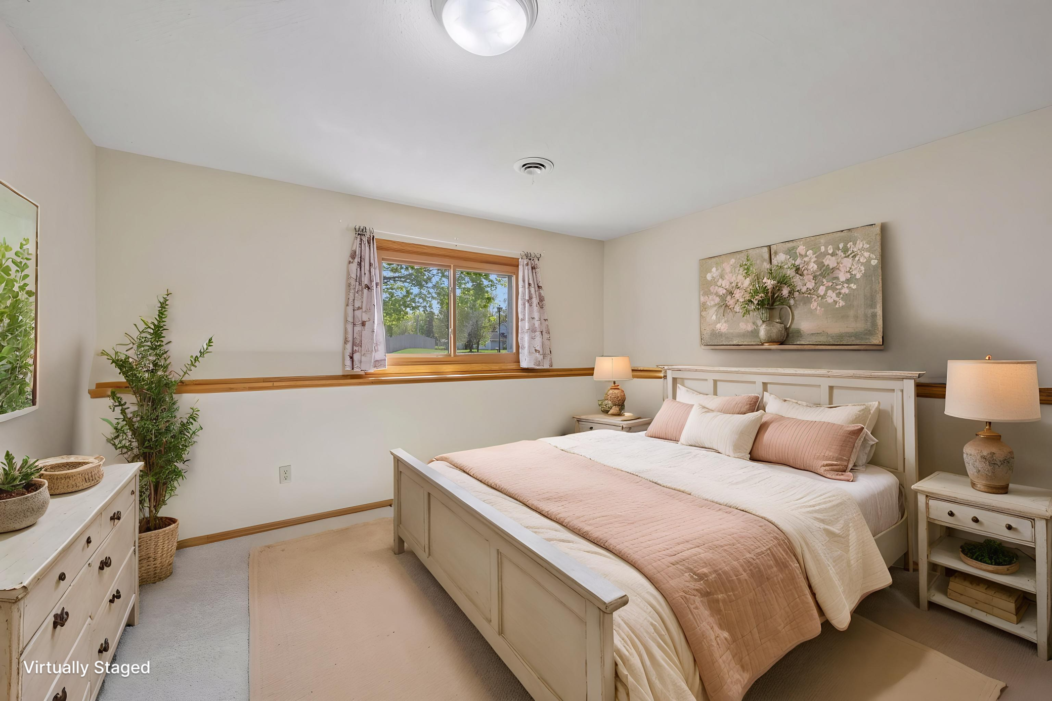 Lower level bedroom virtually staged