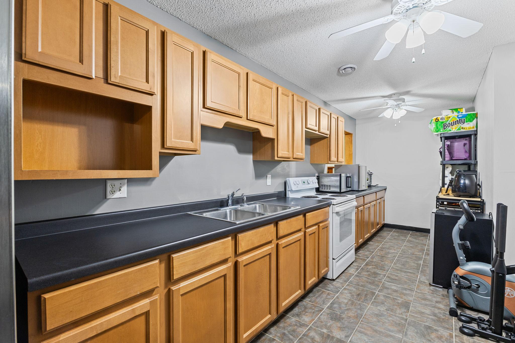 Adjacent to the kitchen is continued storage space for all your belongings.