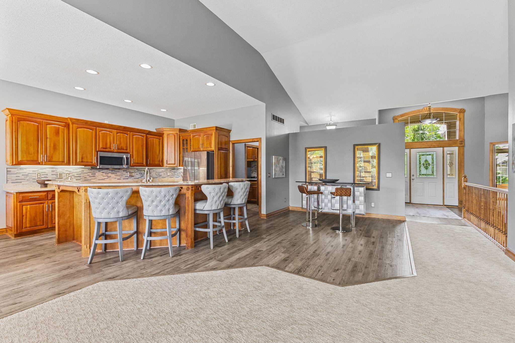Flexible options on how you can enjoy this space! Choose the ultimate happy hour setting as currently shown or add your own dining table for family and friend gatherings.