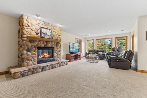 Not quite ready to give up that lower level yet? Well you don't have to! The spacious lower level offers a huge family entertainment room for family, grandkids and friend entertaining!