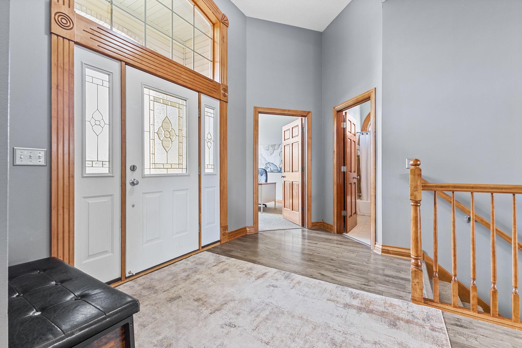 The open & spacious entrance is filled with natural light.
