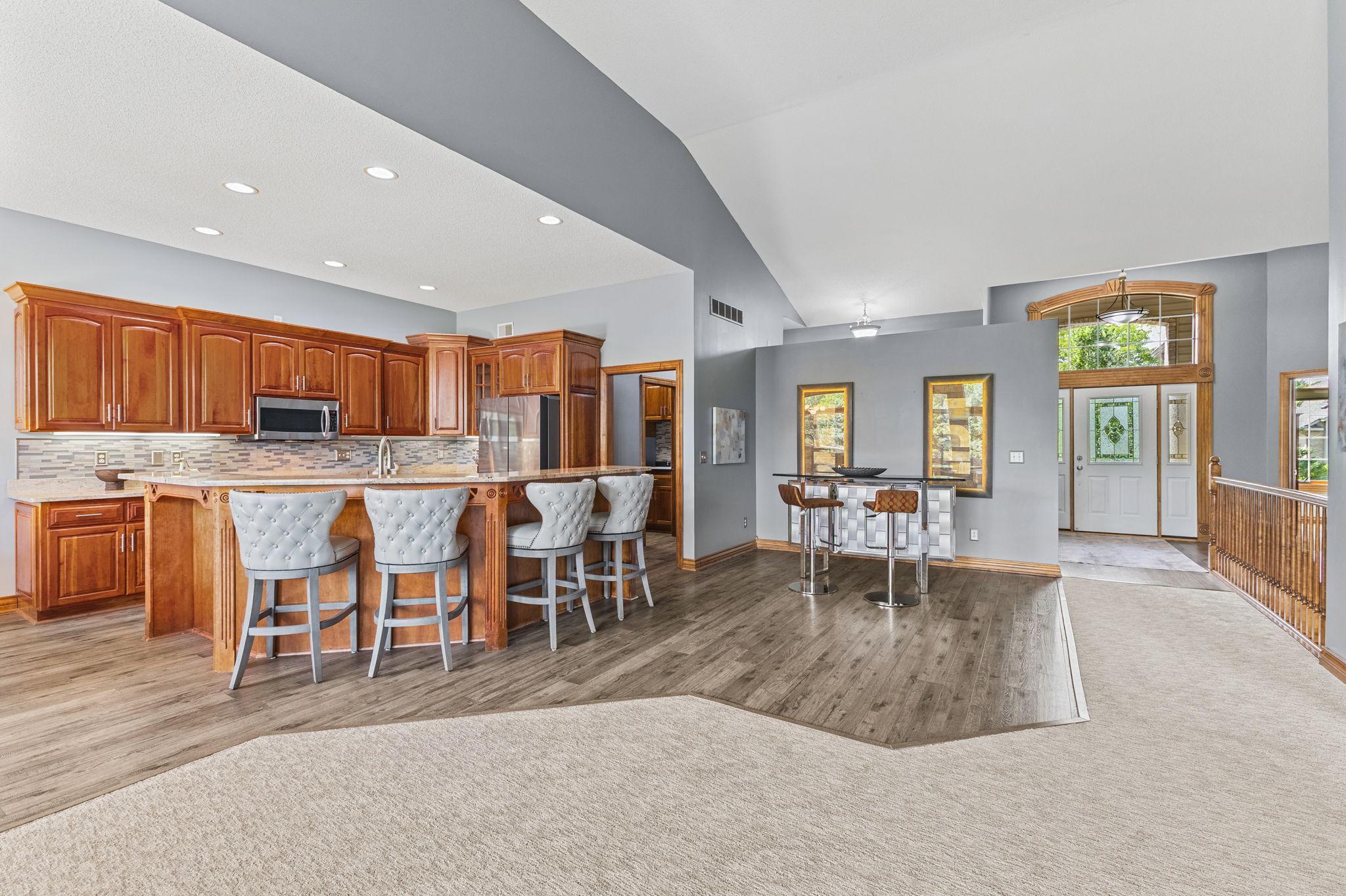 Flexible options on how you can enjoy this space! Choose the ultimate happy hour setting as currently shown or add your own dining table for family and friend gatherings.