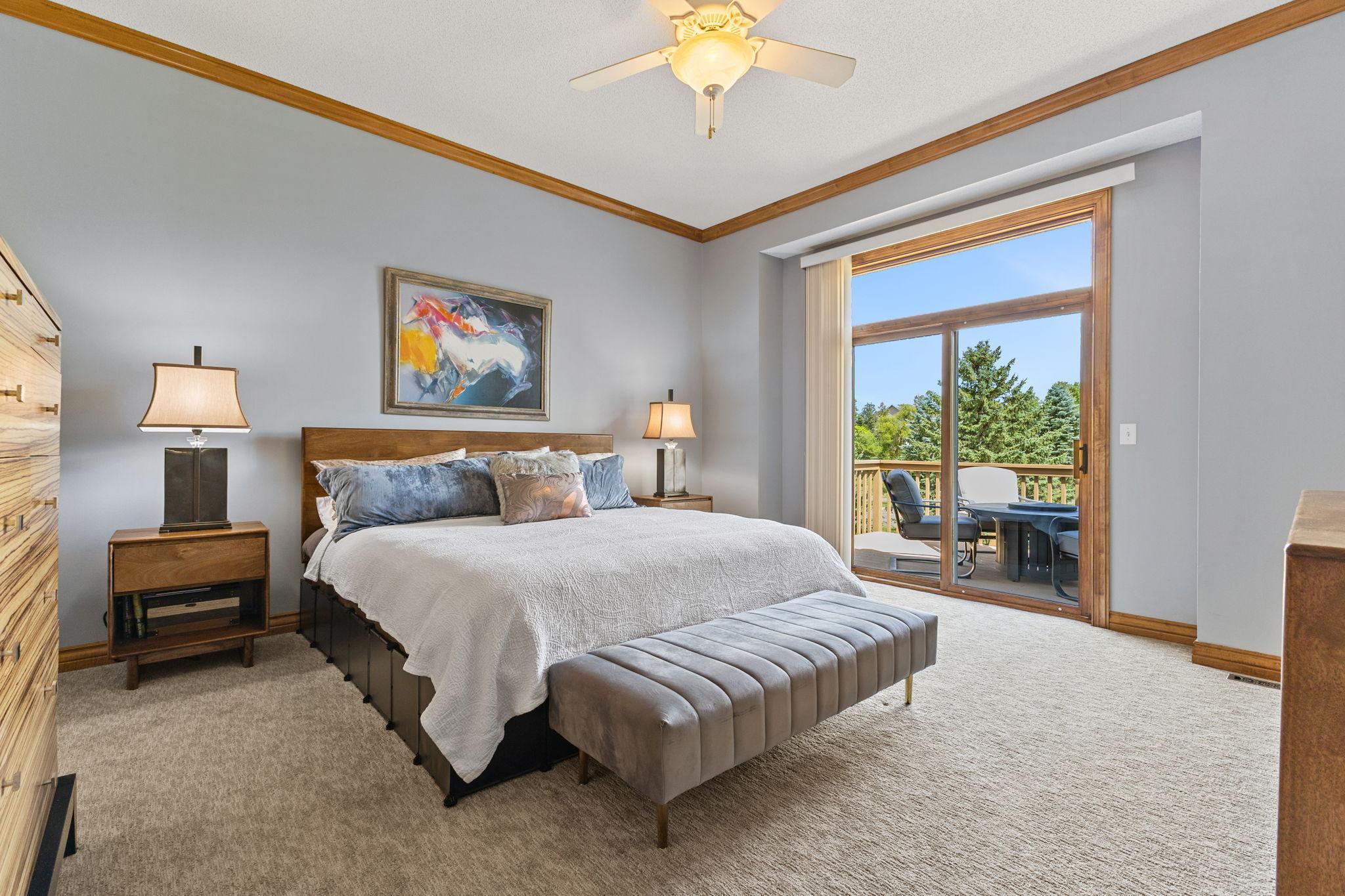Your private personal main level ensuite with natural sunlight filling the space each day. 10' high ceilings, crown molding & neutral & new carpet (2026) continue the luxury finishes throughout.