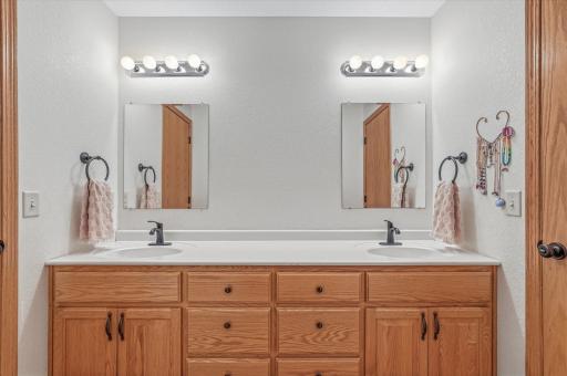 Shared Full bath with double bowl sinks for bedroom 2 and 3
