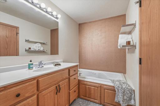 Primary Full Bath with a Jetted Tub and a separate Shower