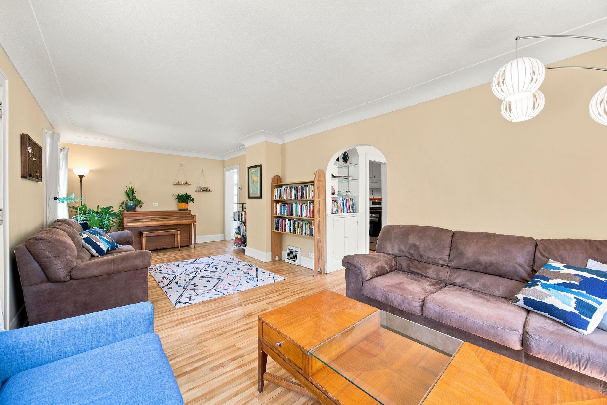 Living Room with arched doorway detail