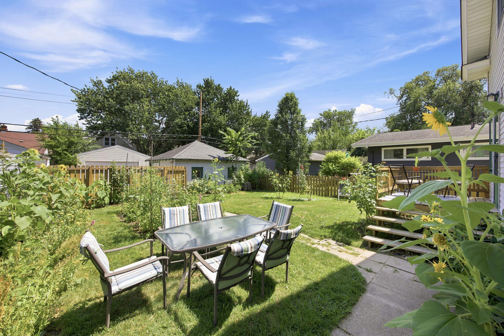 Enjoy al fresco dining in the Backyard among the gardens