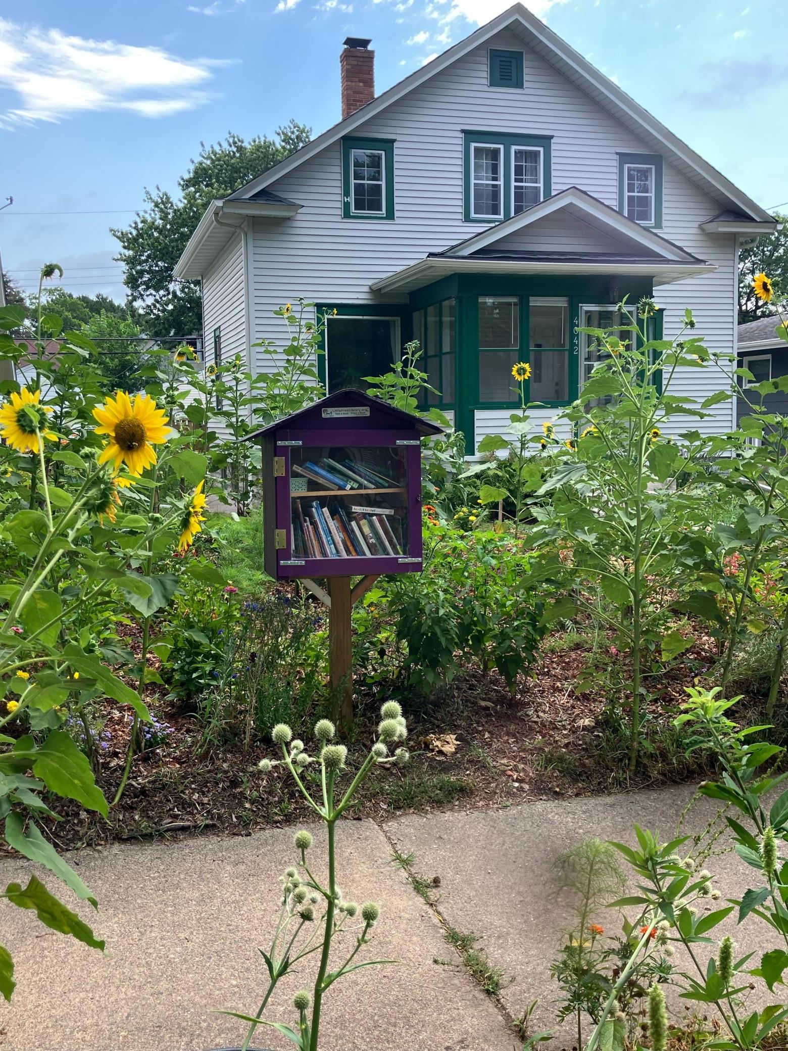 Adorable Little Library out front